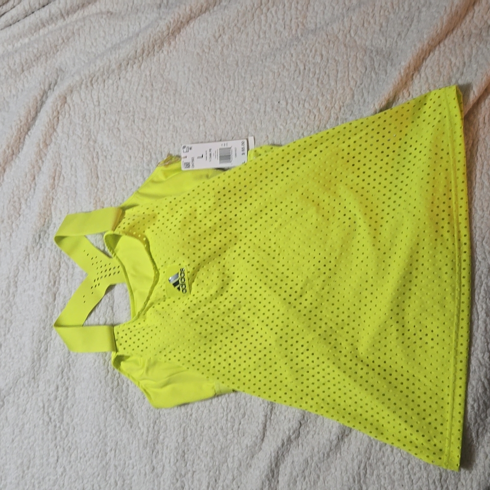 Brand new with tags. Adidas workout tank with built-in bra